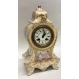 A French Longwy porcelain clock case finely painte