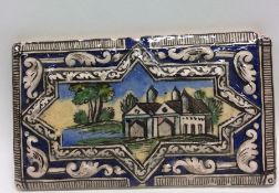 A large Continental tile decorated with buildings