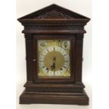 A heavy Edwardian oak cased mantle clock with stri