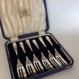 A boxed set of six OE pattern silver cake forks. S