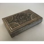 An Eastern rectangular silver cigarette box with h
