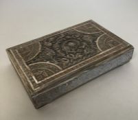 An Eastern rectangular silver cigarette box with h