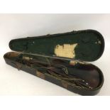 A cased violin together with a bow. Est. £20 - £30
