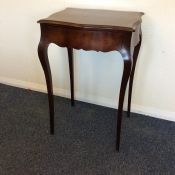 A French single drawer side table on cabriole supp