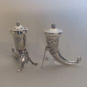 A good pair of Norwegian urn shaped silver peppers