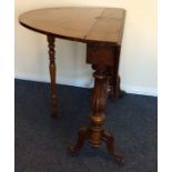 An early Victorian burr walnut Sutherland table wi