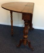 An early Victorian burr walnut Sutherland table wi