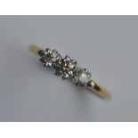 A good Antique diamond three stone ring in claw mo