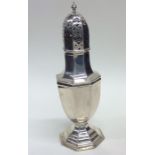 A tall octagonal shaped silver caster. Birmingham.