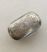 A large bright cut silver dome top nutmeg grater w