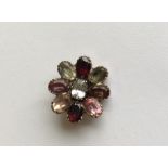 An Antique garnet and crystal brooch in the form o