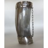 A Continental silver embossed and horn decorated c