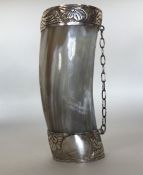 A Continental silver embossed and horn decorated c