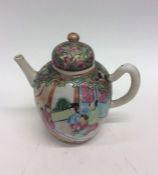 A small baluster shaped Canton teapot decorated wi