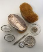 A silver mounted lucifer, hairbrush, watch etc. Es