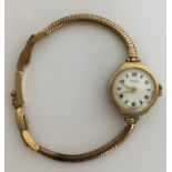 A lady's 9 carat Rotary wristwatch with white enam