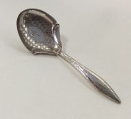 A good Victorian bright cut silver caddy spoon. Bi