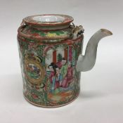 A Canton teapot with rope decorated handle. Approx