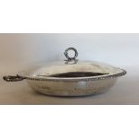 A Victorian circular silver entrée dish and cover