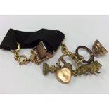 A small ribbon mounted with seals, fobs, lockets e