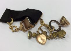 A small ribbon mounted with seals, fobs, lockets e