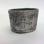 A good large Chinese silver slave bangle with fili