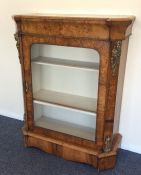 A burr walnut Victorian inlaid pier cabinet with b