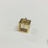 An 18 carat gold diamond mounted pendant inset wit