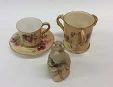 A Royal Worcester porcelain small blush ivory grou