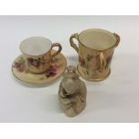 A Royal Worcester porcelain small blush ivory grou