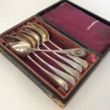 A boxed set of six Continental silver spoons decor