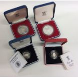 A cased silver Royal Mint £2 coin together with on