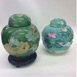 Two Chinese style ginger jars with covers. Approx.