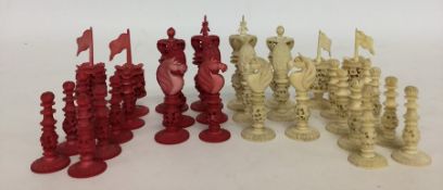 A good quality carved ivory chess set of typical f
