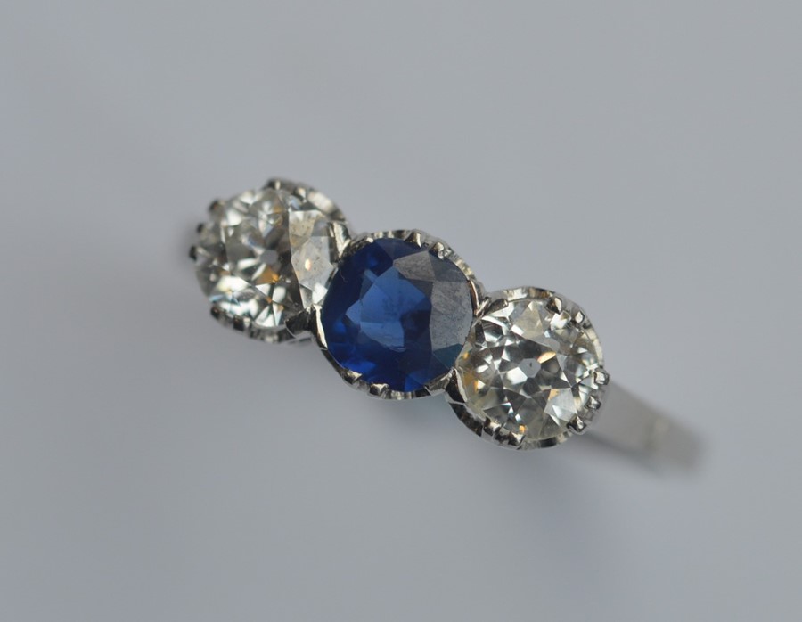 A good sapphire and diamond three stone ring attra