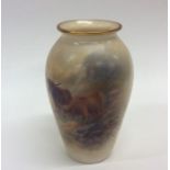 A Royal Worcester porcelain oviform vase painted w