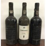 Three x 75cl bottles of Sandeman Vintage 1985 Port. Labels