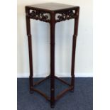 A good large Chinese hardwood stand with scroll de