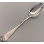 A Georgian Hanoverian rat tail silver tablespoon.