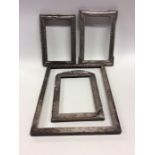 A group of four silver mounted picture frames of v