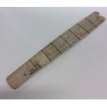 An unusual whalebone cribbage board etched with a