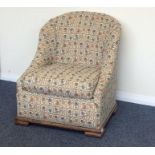 A stylish oak framed chair on stepped base. Est. £