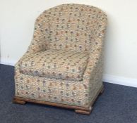 A stylish oak framed chair on stepped base. Est. £