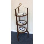 An Edwardian brass mounted cake stand. Est. £20 -