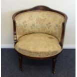 A late Victorian saloon chair with shell inlay. Es