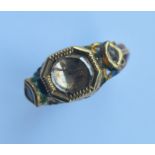 An Antique Indian enamel decorated gold ring inset