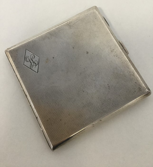 A good quality square silver engine turned cigaret