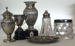 A good collection of silver mounted jars, peppers,