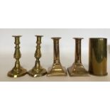 A pair of Antique brass candlesticks together with