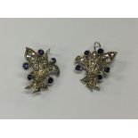 A pair of sapphire and diamond drop earrings in th